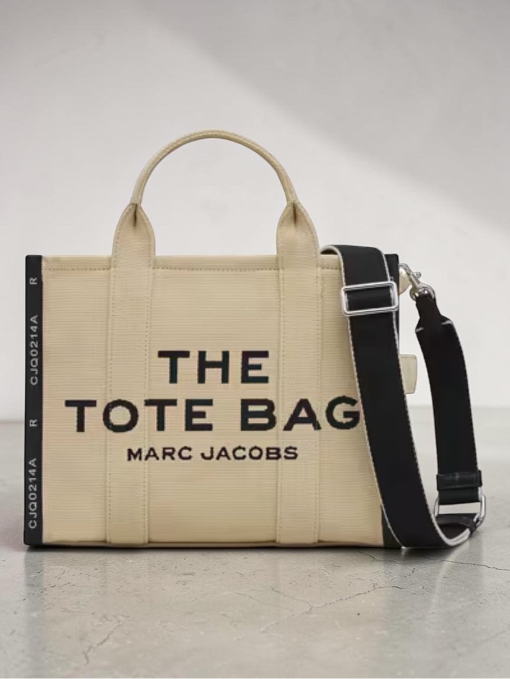 Marc Jacobs®️ The Jaquard
Medium Tote Bag with Black Logo • Warm Sand